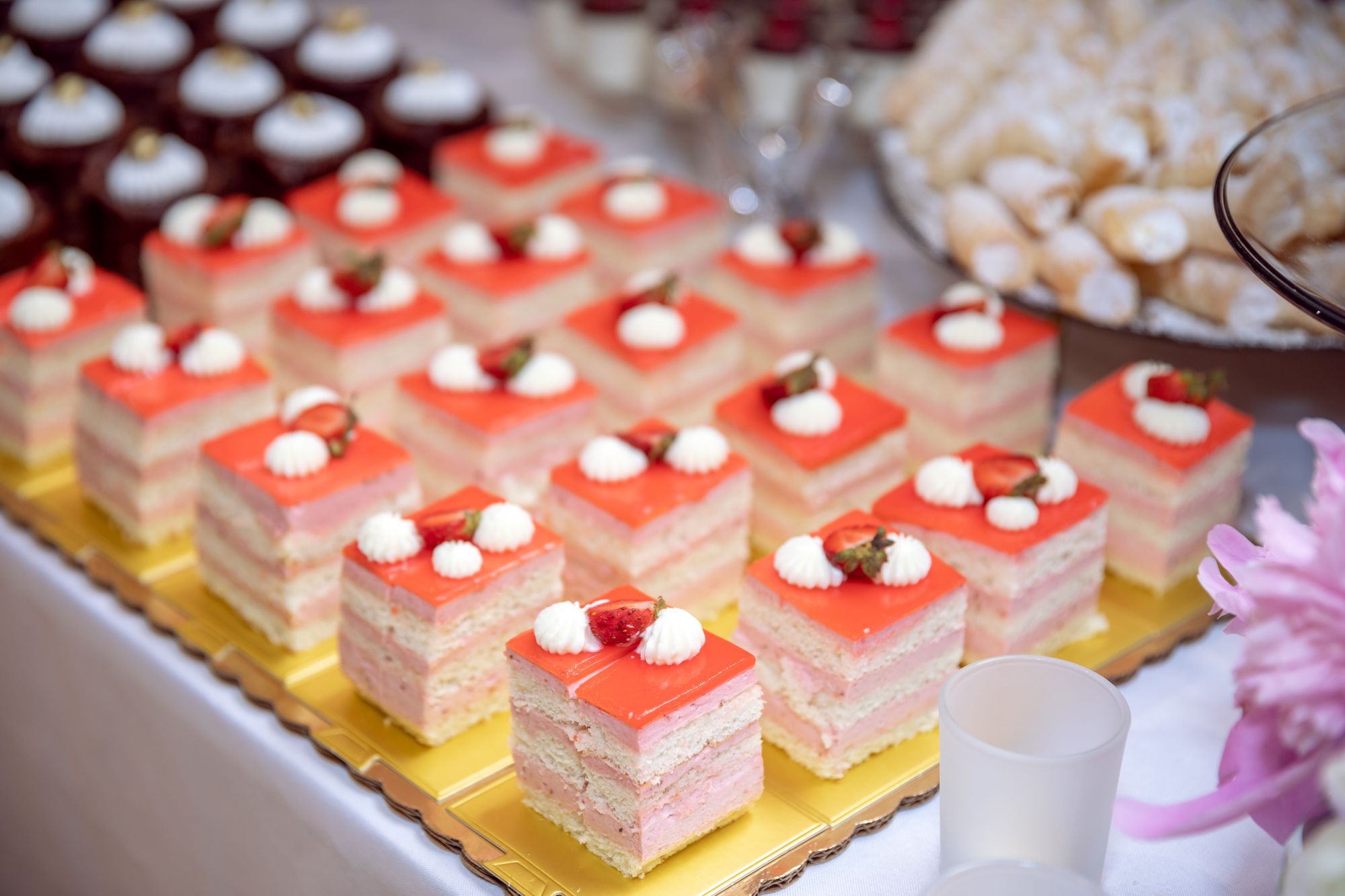 Petits fours arranged on a tray